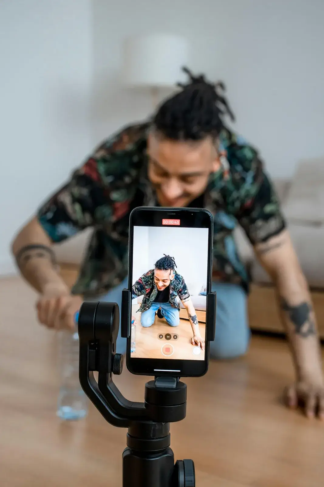Content creator filming a video for social media audience engagement