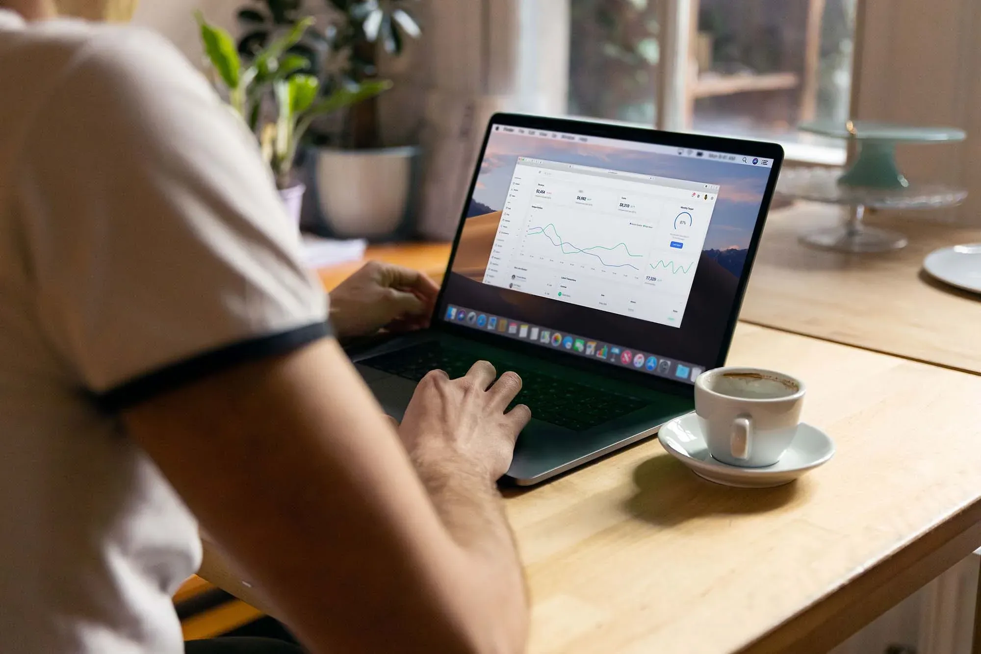 Person reviewing a social media analytics dashboard on a laptop